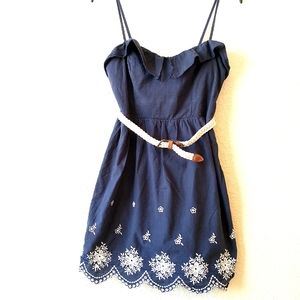 Dress for spring or summer. Navy blue, flowers embroidery details. Size 7